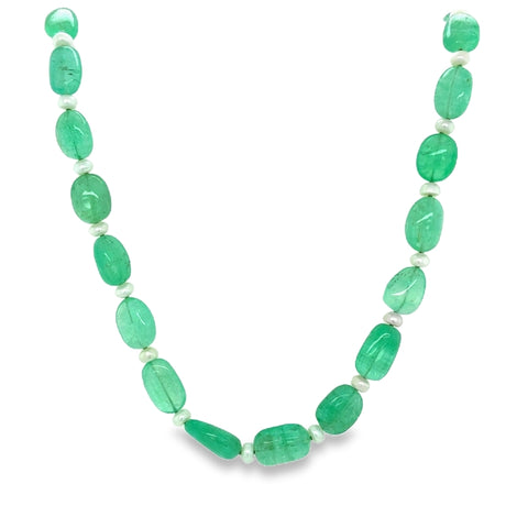 Necklace with emerald beads on a white background